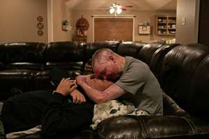 Zachary Sutterfield spends time with his father, Karl Sutterfield, at their San Angelo home. The family verbally and physically expresses their love for each other every day, frequently saying “I love you,” and embracing often.
