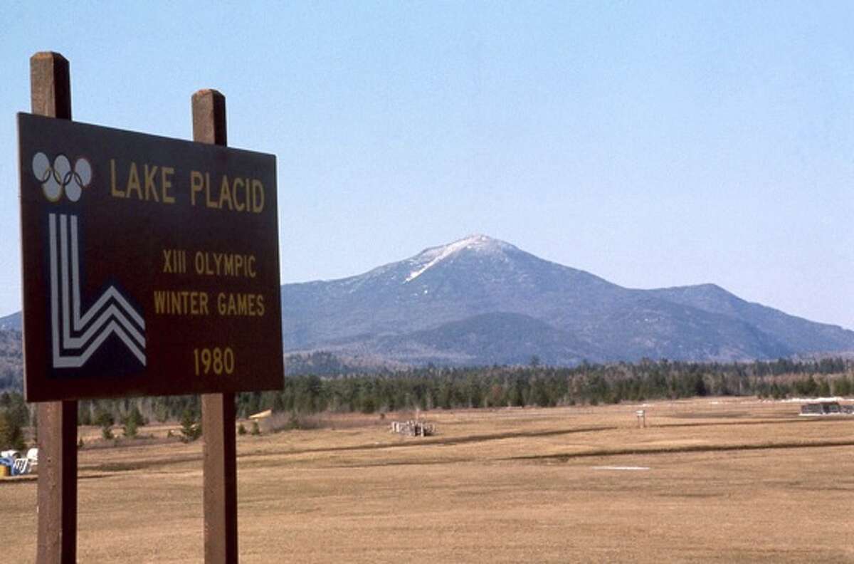 Many of the fields and golf courses around Lake Placid were bare leading up to the XIII Olympic Winter Games in 1980. Organizers relied heavily on snowmaking technology and refrigerated ice tracks to make these the “weatherproof” games. It was the first Winter Olympics to use artificial snow, which was made at various venues and trucked around to ski venues where it was most needed. (Courtesy of NOAA)