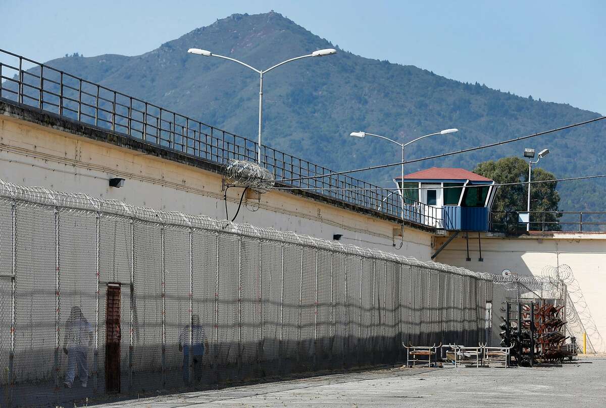 Mount Tamalpais rises above San Quentin State Prison in San Quentin, Calif. on Thursday, Sept. 12, 2019. The Robert E. Burton Adult School at the prison has been designated as a "distinguished school," the first school within the California corrections system to achieve the honor.