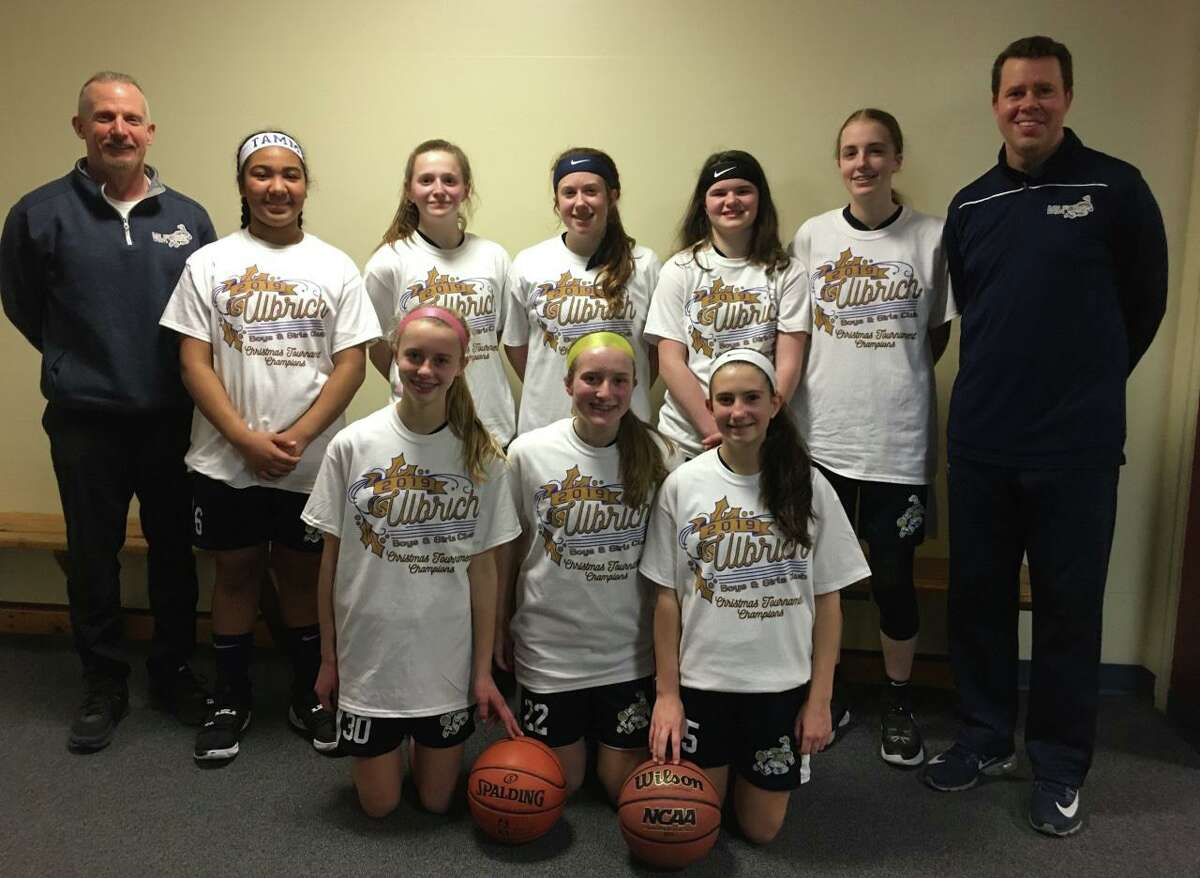 The Milford Knights 8th grade girls travel basketball team swept its way to the title. Team members (front row) are Faith Doyle, Abby Savoie and Maya Pinto; (second row) coach Mike Donegan, Tiffany Rosado, Maggie Wetmore, Erin Donegan, Zoe Johnson, Chloe Haasch and coach Trevor Doyle.