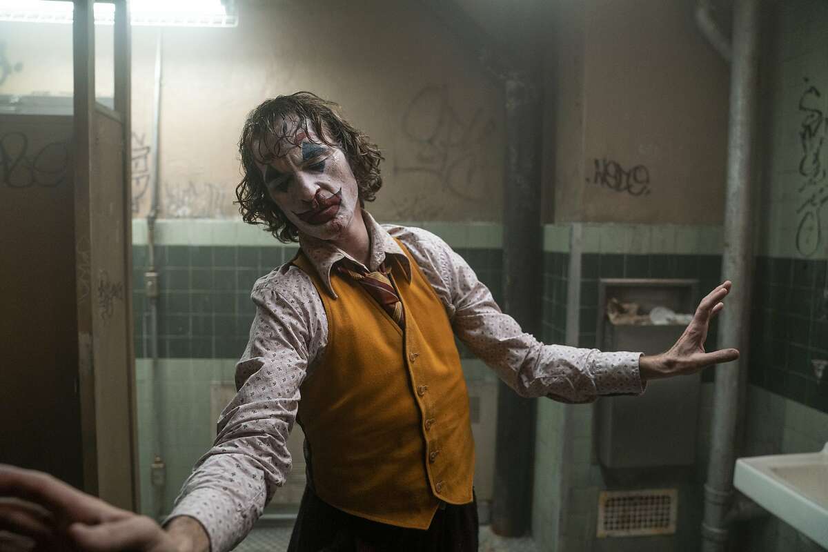 This image released by Warner Bros. Pictures shows Joaquin Phoenix in a scene from "Joker." The film is nominated for a Golden Globe for best motion picture drama.