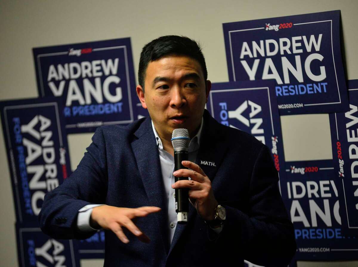 Democratic presidential candidate businessman Andrew Yang talks to supporters while opening up a new campaign office in Keene, N.H., Wednesday, Jan. 1, 2020. (Kristopher Radder/The Brattleboro Reformer via AP)