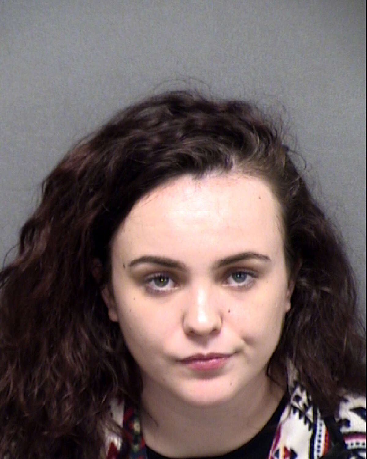 Lani Elizabeth Taylor, 22, was arrested Thursday and charged with cruelty to non-livestock animals after police said she did not properly care for her grandmother's dogs.
