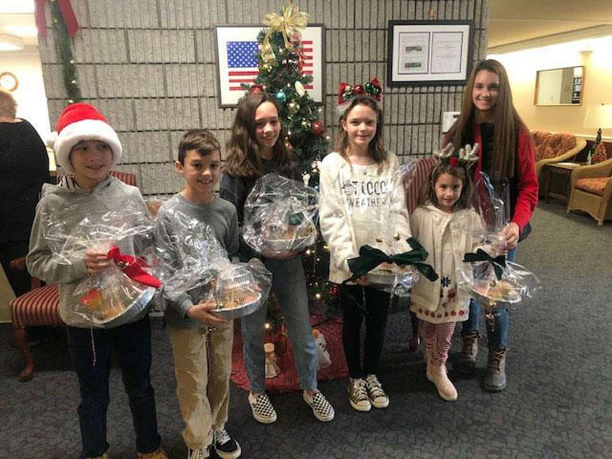 Helping the Wilton Woman's Club were, from left, Johnny Bittner, Nathan Partenza, Piper Bittner, Charlotte McCall, Chloe Partenza and Ava Partenza.