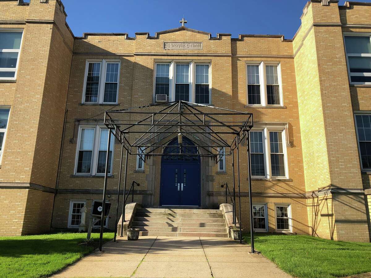 The St. Joseph Church-owned building at 430 Coram Avenue presently houses the Echo Hose Community Education Center. The building has been listed for sale, and developers have plans to place apartments in the building.