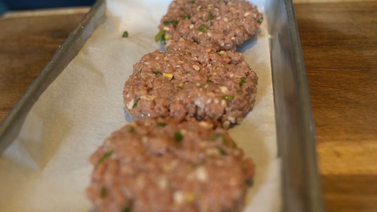 Raw Impossible Pork, formed into patties. Following the Impossible Burger, Impossible Foods announced its next vegan meat product will be pork.