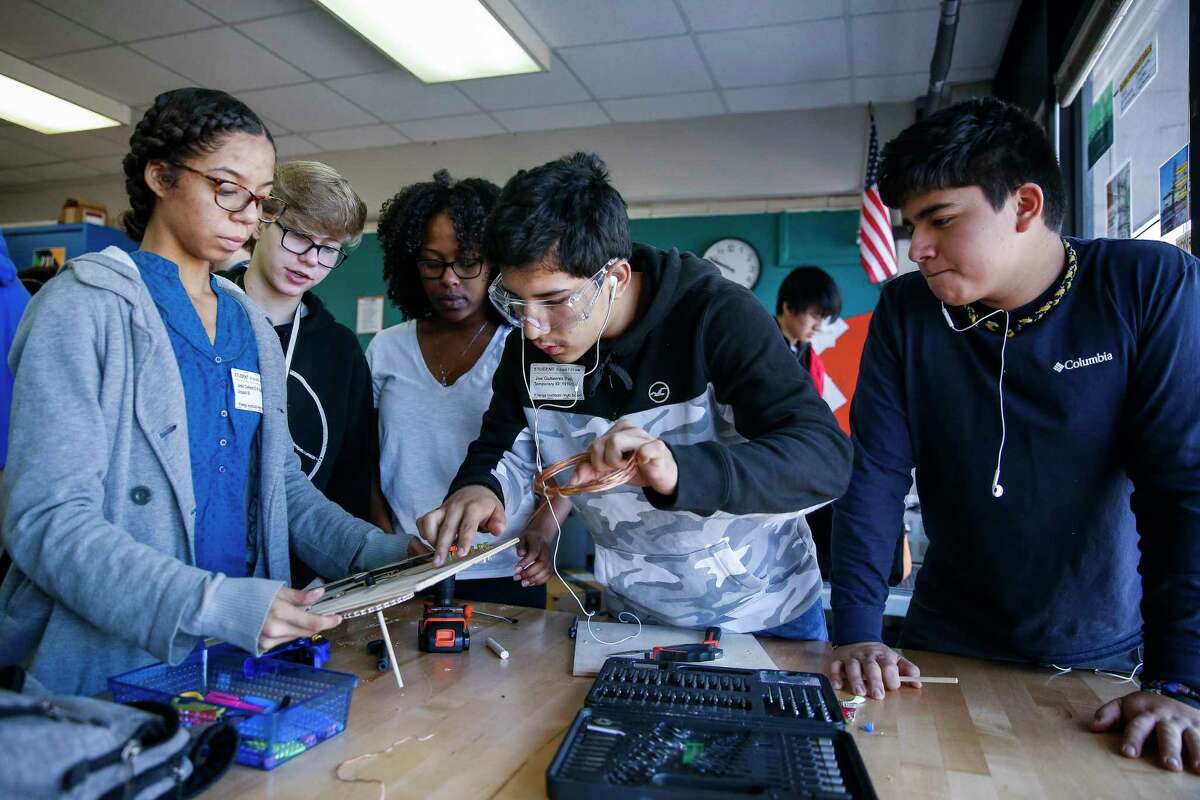 In this 2018 file photo, students at Houston ISD’s Energy Institute High School work on a motorized panel illustrating the advances in hydropower over the course of history. HISD officials plan to study equity in access to magnet and specialty schools, like the STEM-focused Energy Institute, in conjunction with researchers from Rice University.