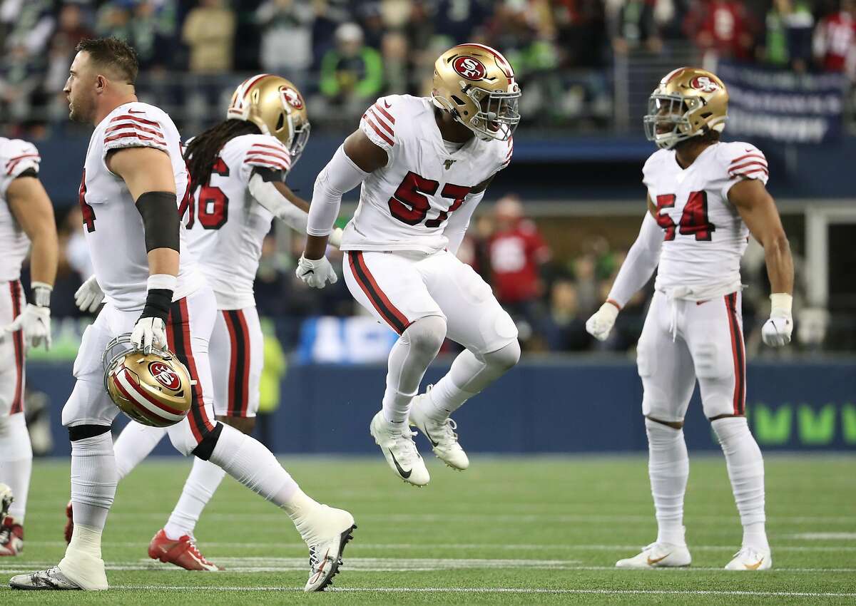 San Francisco 49ers linebacker Dre Greenlaw returns an intercepted pass  during the Seattle Seahawks 26-23 overtime win in a NFL football game  Monday, Nov. 11, 2019 in Santa Clara, CA. (Daniel Gluskoter/AP