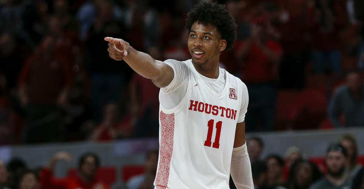 Houston Cougars guard Nate Hinton (11) celebrates after dunking the ball against the UCF Knights during the second half of an NCAA game at the Fertitta Center Friday, Jan. 3, 2020, in Houston. The Cougars won 78-63.