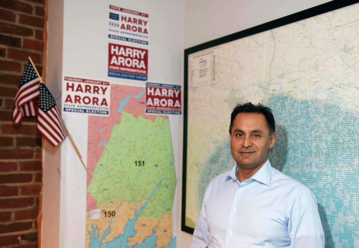 Republican State Representative candidate Harry Arora poses at his office in downtown Greenwich, Conn. Monday, Dec. 30, 2019.
