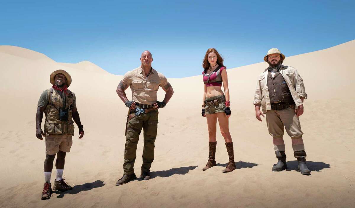 This image released by Sony shows Kevin Hart, from left, Dwayne Johnson, Karen Gillan and Jack Black in a scene from "Jumanji: The Next Level." (Hiram Garcia/Sony via AP)
