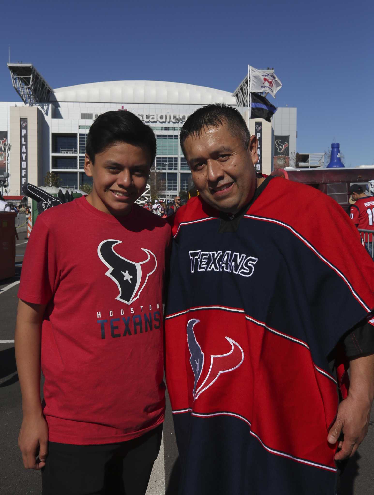 January 4, 2020: Houston Texans fans wave flags during the 1st quarter of  an NFL football playoff game between the Buffalo Bills and the Houston  Texans at NRG Stadium in Houston, TX.