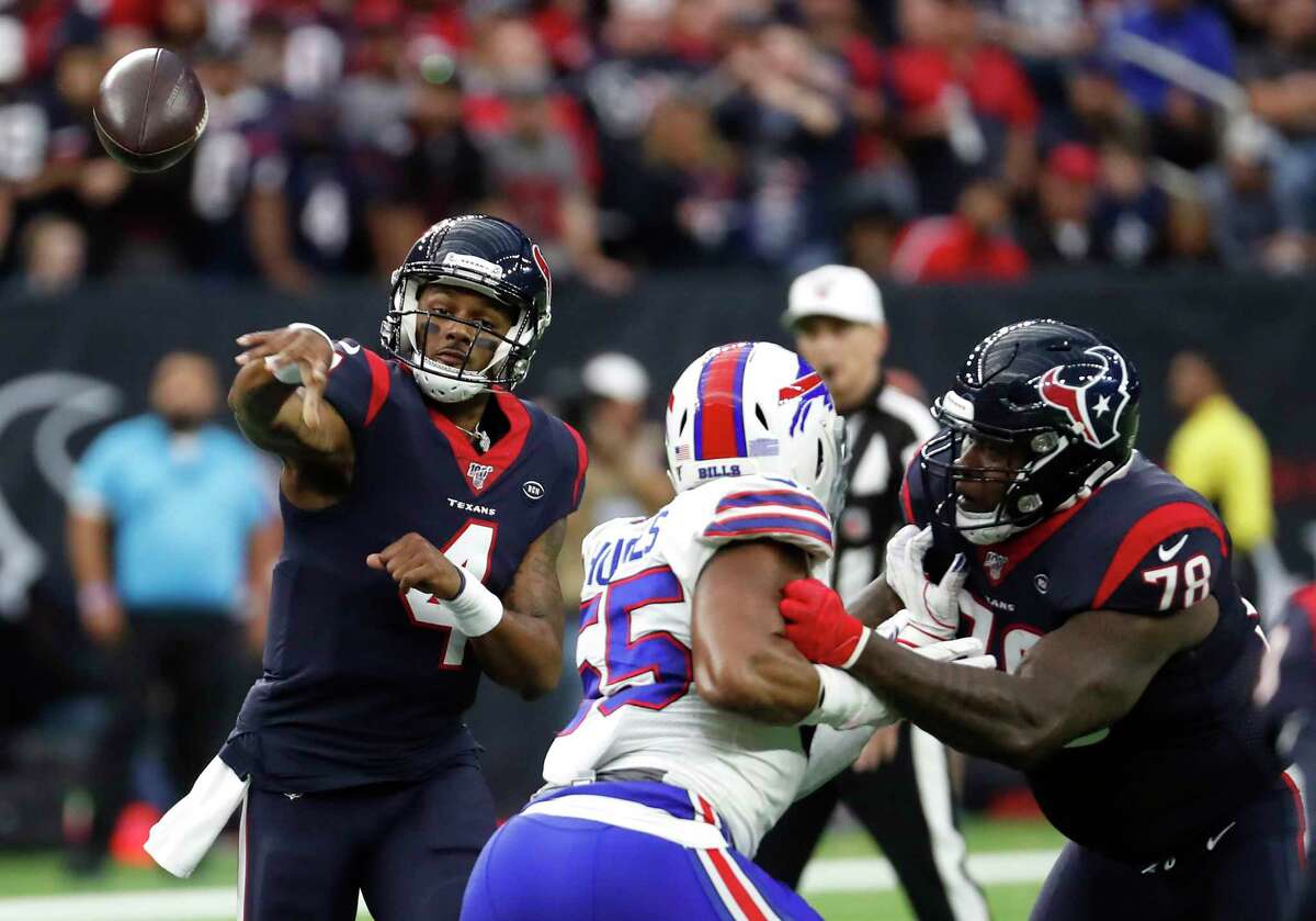 Houston Texans quarterback Deshaun Watson (4) throws a pass against the Buffalo Bills during an AFC wild card playoff game at NRG Stadium on Saturday, Jan. 4, 2020, in Houston.