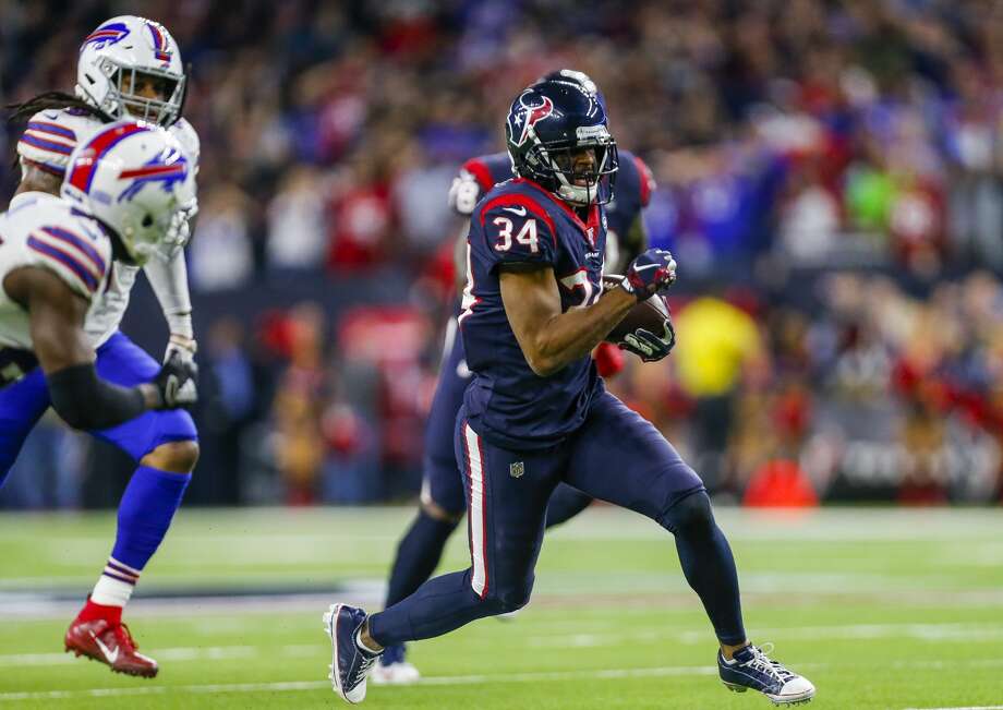 PHOTOS: Sequence shots of Taiwan Jones' huge play in the playoff win over the Bills
Houston Texans running back Taiwan Jones (34) runs after making a catch for 34 yards, setting up the game-winning field goal against the Buffalo Bills during overtime of an AFC Wild Card playoff game at NRG Stadium Saturday, Jan. 4, 2020, in Houston. The Texans won 22-19. Photo: Godofredo A Vásquez/Staff Photographer