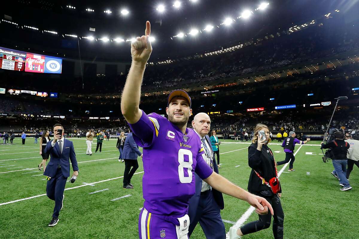 Kirk Cousins #8 of the Minnesota Vikings celebrates after defeating the New Orleans Saints 26-20 during overtime in the NFC Wild Card Playoff game at Mercedes Benz Superdome on January 05, 2020 in New Orleans, Louisiana. (Photo by Kevin C. Cox/Getty Images)