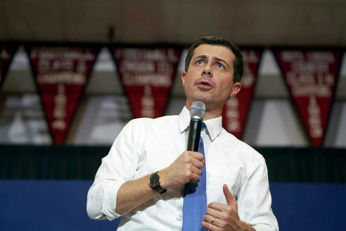 Former Mayor Pete Buttigieg of South Bend, Ind., a Democratic presidential candidate, speaks during a town hall-style campaign event in Claremont, N.H., Jan. 4, 2020. With foreign policy emerging as a top priority in the Democratic primary, Buttigieg, a former naval intelligence officer, is leaning harder on his veteran status. (David Degner/The New York Times)