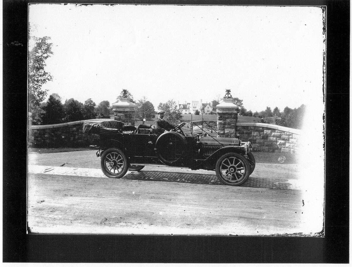 F. E. Lewis in a 1919 Packard.