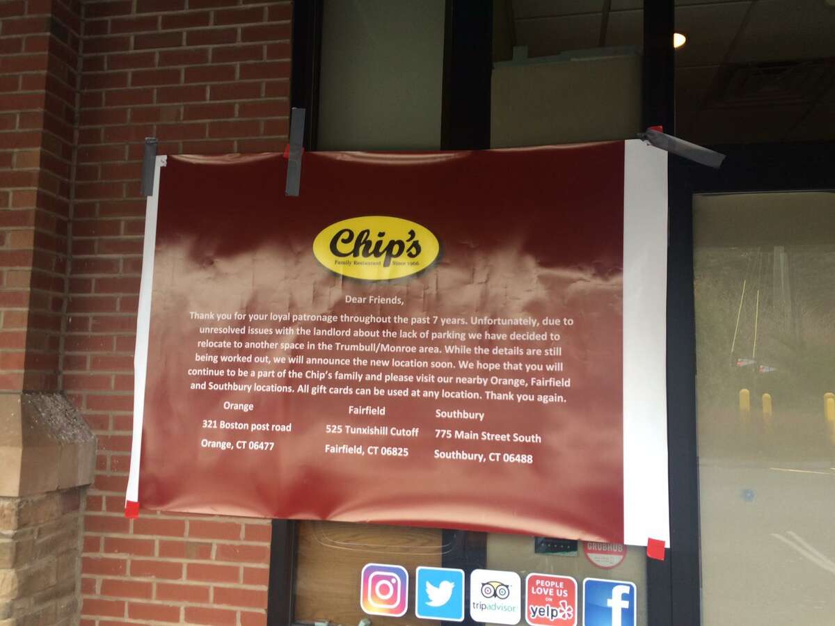 A sign on the door of Chip's restaurant informs the public that the restaurant has closed while the owners seek a new location.