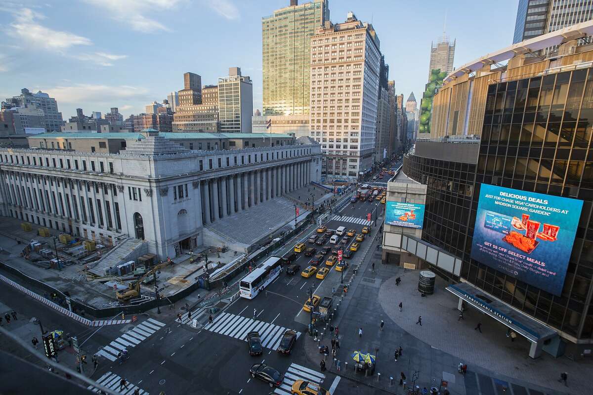 **EMBARGO: No electronic distribution, Web posting or street sales before SUNDAY 3:00 a.m. ET Jan. 5, 2020. No exceptions for any reasons. EMBARGO set by source.** FILE -- The Farley Building, left, opposite Penn Station in Manhattan, Dec. 14, 2015. Facebook plans to put as many as 2,500 workers in the Farley Building, part of a rush by the West Coast technology giants to expand in New York City. (Hiroko Masuike/The New York Times)