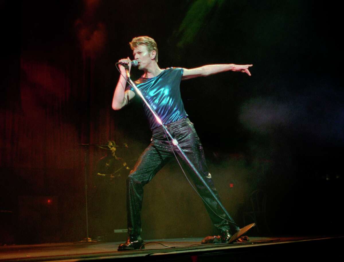 FILE - In this Sept. 14, 1995, file photo, David Bowie performs in Hartford, Conn.