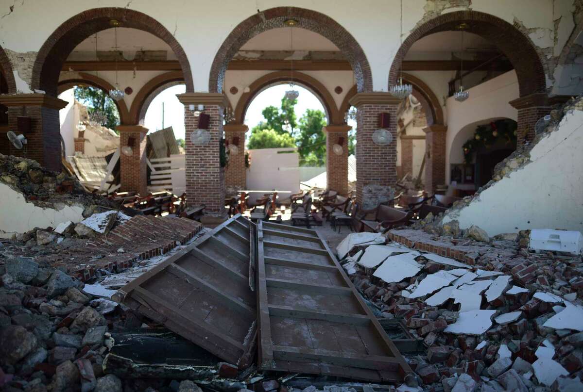 The Immaculate Concepcion Catholic church lies in ruins after an overnight earthquake in Guayanilla, Puerto Rico, Tuesday, Jan. 7, 2020. A 6.4-magnitude earthquake struck Puerto Rico before dawn on Tuesday, killing one man, injuring others and collapsing buildings in the southern part of the island.