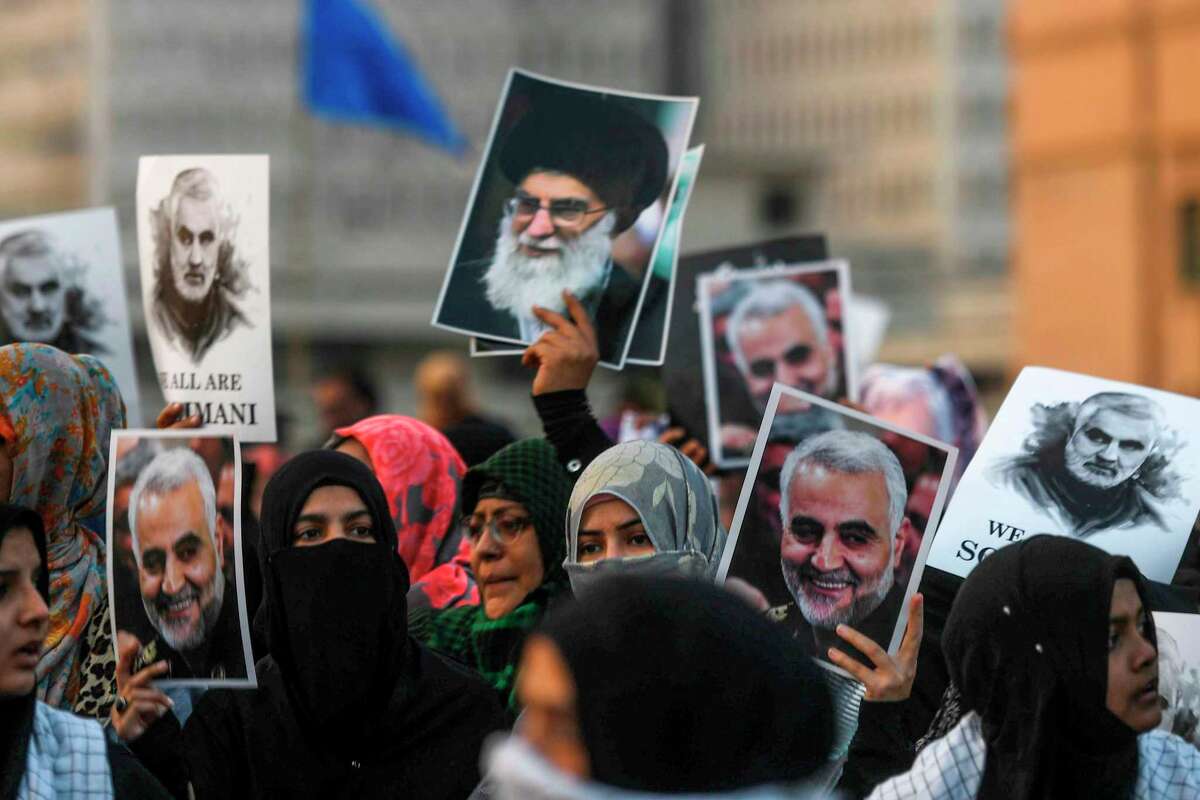 Shiite Muslims march to protest against the US strike that killed Iranian commander Qasem Soleimani in Iraq, during a demonstration in Karachi on January 5, 2020. - A US drone strike killed top Iranian commander Qasem Soleimani at Baghdad's international airport on January 3, dramatically heightening regional tensions and prompting arch enemy Tehran to vow "revenge". (Photo by Rizwan TABASSUM / AFP) (Photo by RIZWAN TABASSUM/AFP via Getty Images)
