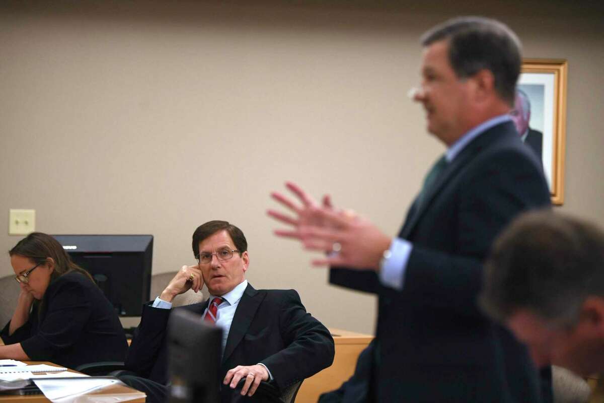 Douglas Sutter, left, attorney for lake area property owners, listens as Travis J. Sales, attorney for the Guadalupe-Blanco River Authority, speaks during a hearing in Seguin at which Sutter asked Visiting Judge Stephen B. Ables to compel the GBRA to turn over documents on Tuesday, Jan. 7, 2020. Six aging dams owned by the GBRA have failed or are in danger of failing.