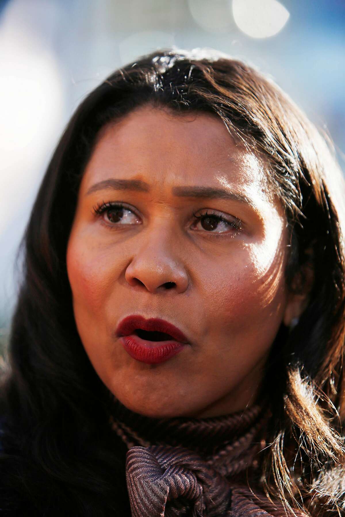 Mayor London Breed answers questions from the media after speaking at a press conference at Union Square on Monday, December 16, 2019 in San Francisco, Calif.