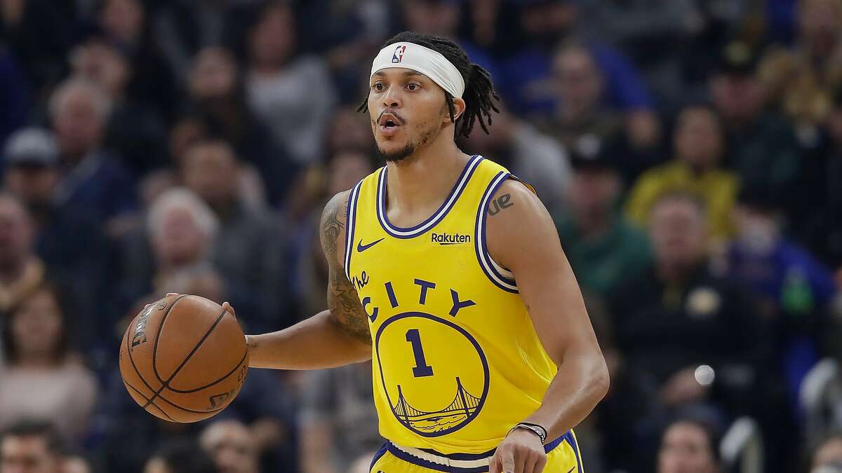 Golden State Warriors guard Damion Lee (1) against the Phoenix Suns during an NBA basketball game in San Francisco, Friday, Dec. 27, 2019. (AP Photo/Jeff Chiu)