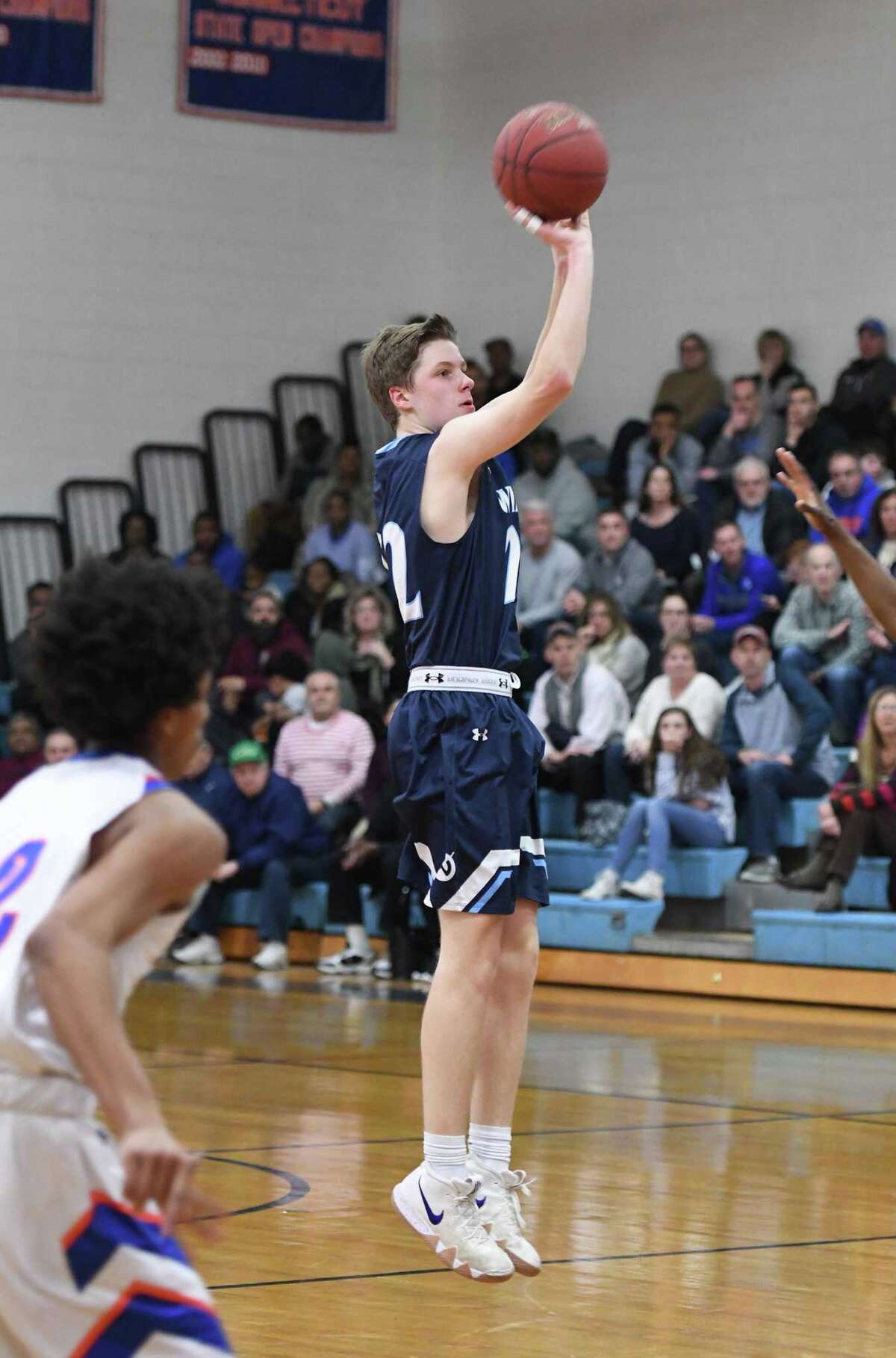Andrew Smith (shown against Danbury last season) scored 22 points as Wilton defeated Norwalk on Tuesday night.
