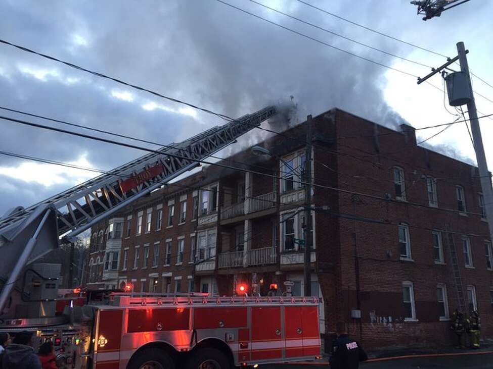 Residents flee into cold as Troy building burns