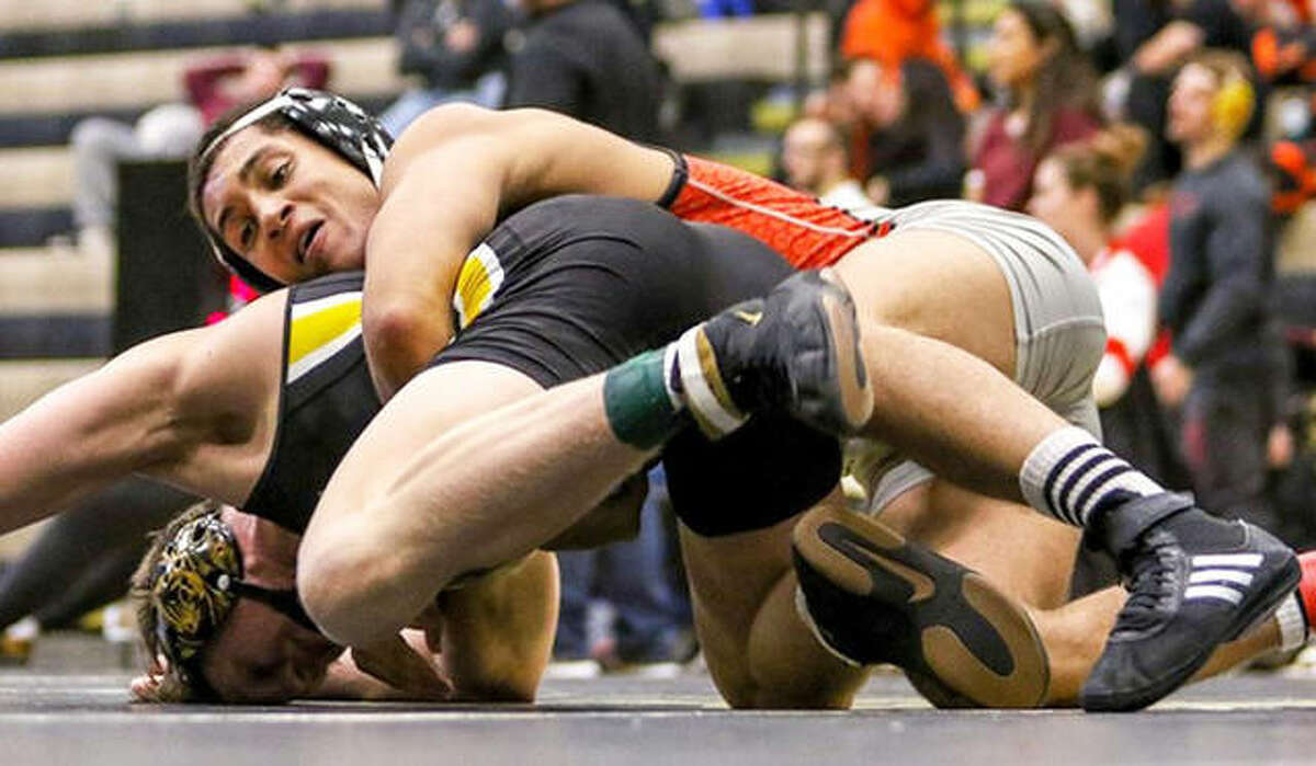 SIUE’s Justin Ruffin (top) was a double winner Tuesday in duals against Kent State and Clarion. He is shown in action earlier this season.