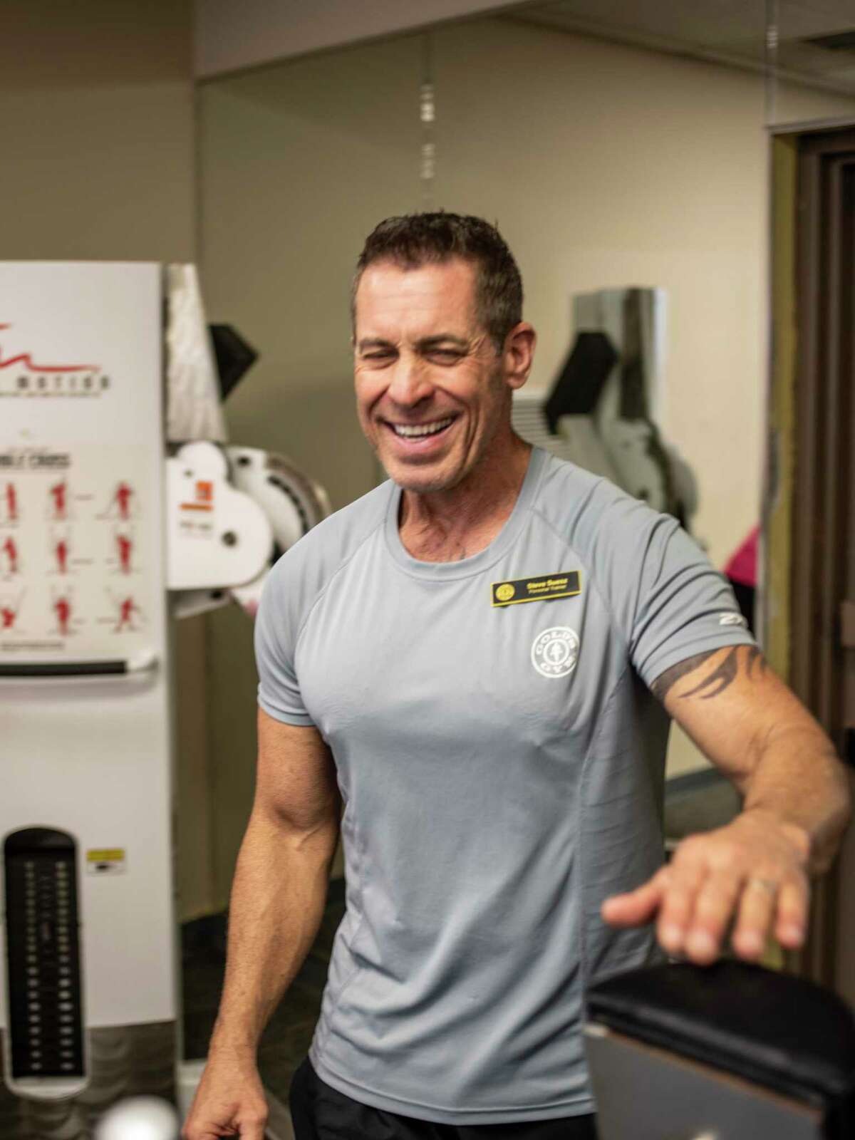 Personal trainer Steve Suesz, 61, shares a laugh with his client, Rose Ramirez (not pictured) at the Gold’s Gym in in Hill Country Village. Suesz, who has a certification in senior fitness, says that as people get older, their muscle strength atrophies, and it becomes easier for their bones to break.