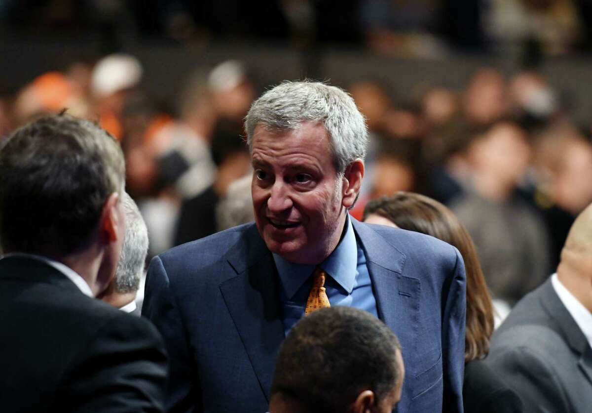 New York City Mayor Bill de Blasio meets with guests before the start of Gov. Andrew Cuomo's 2020 State of the State Address on Wednesday, Jan. 8, 2020, at Empire State Plaza Convention Center in Albany, N.Y. (Will Waldron/Times Union)