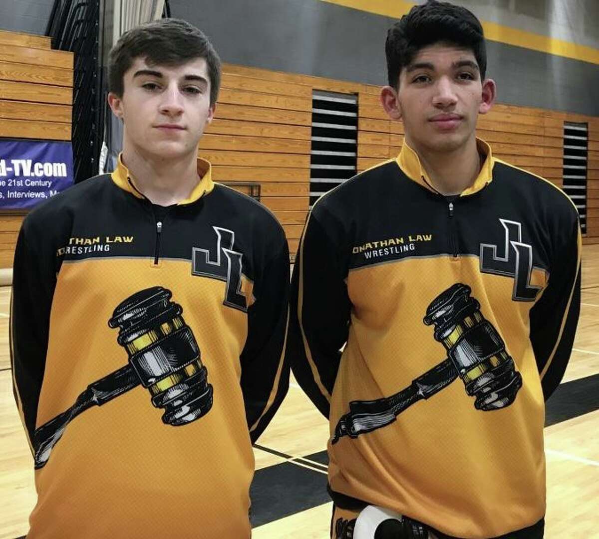 Jonathan Law co-captain's Alex DeLorio and Antonio Rosado posted wins in the match with Shelton.