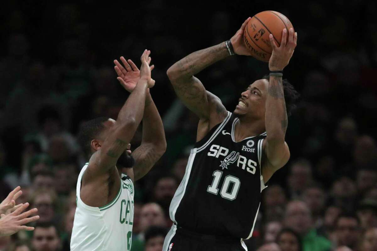Spurs forward DeMar DeRozan shoots over Celtics guard Brad Wanamaker in the third quarter. DeRozan went 10 of 17 from the field and hit all 10 of his free throws for a game-high 30 points.