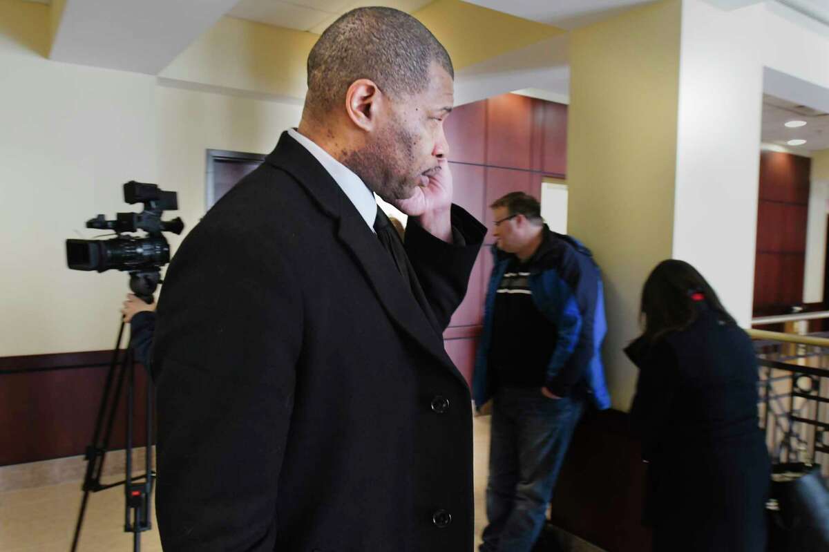 Brian Angelo, known as DJ Iroc, walks out of court on Thursday, Jan. 9, 2020, in Albany, N.Y. Angelo and his attorney were in court to ask for the judge to order that his lawyers be allowed to examine a local radio station where it is alleged that Angelo assaulted a victim. (Paul Buckowski/Times Union)