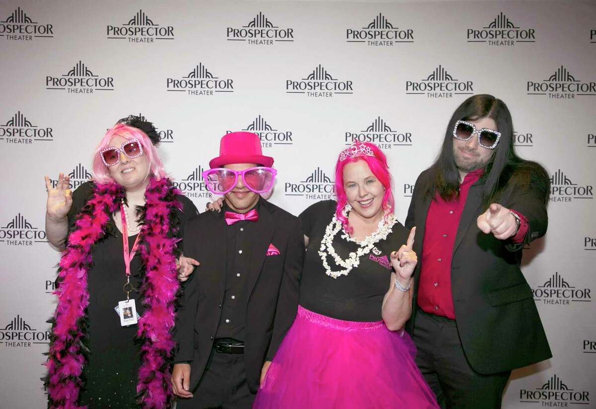 At the Prospector Theater's fifth anniversary party, Prospects Rachel Wise, Thomas DiVittorio, and lead guitarist Ryan Carnage, from left to right, wore pink along with theater owner and founder Valerie Jensen, second from right.