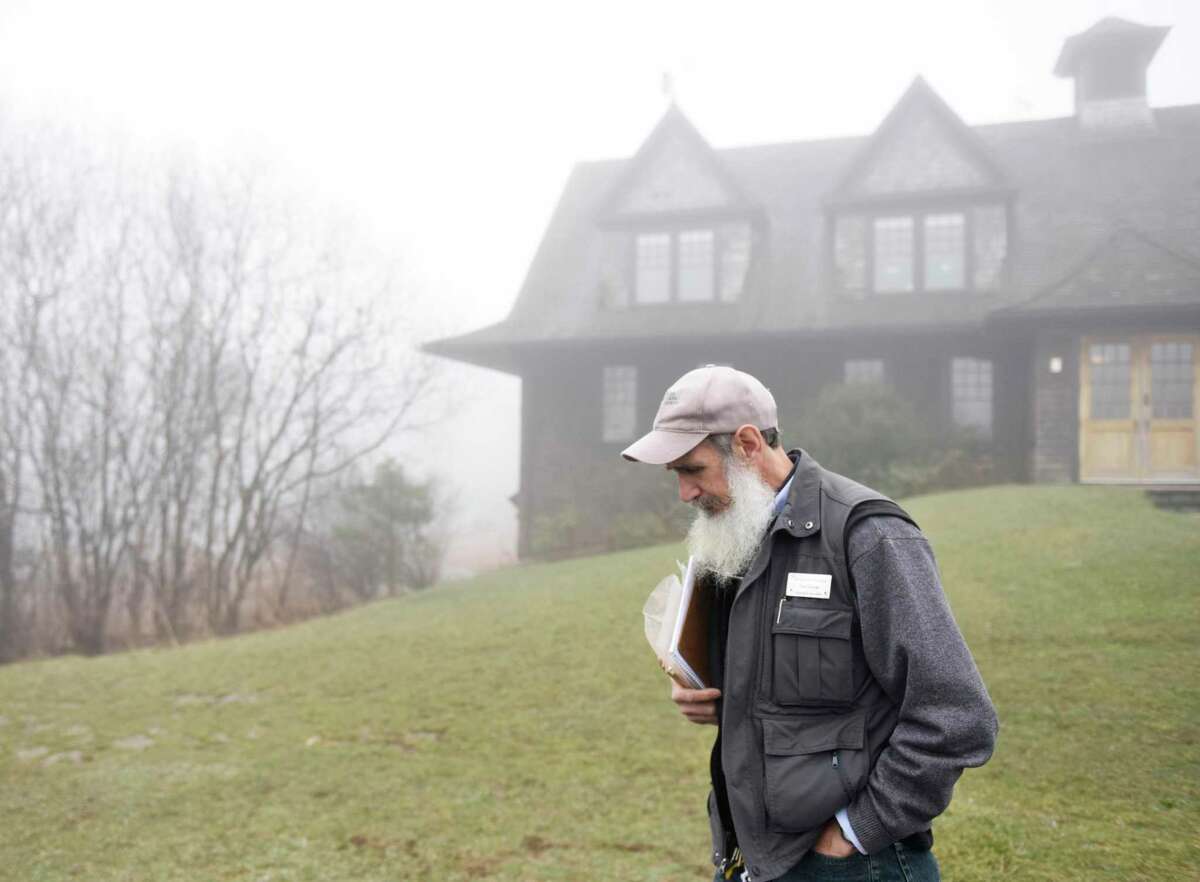 Senior Naturalist and Environmental Education Specialist Ted Gilman walks on the property at Greenwich Audubon in Greenwich, Conn. Wednesday, April 4, 2018. Gilman has touched the lives of many birdwatchers and conservationists in Greenwich and will receive the Audubon Katie O'Brien Lifetime Achievement Award later this month.