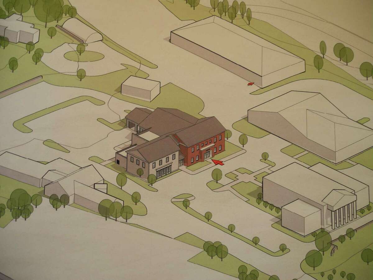 An aerial view shows where a new police station would be situated on the town hall campus. The committee is considering moving the site to the end of the main driveway, which would require demolishing the annex. Such a move would improve parking and traffic circulation on the campus.
