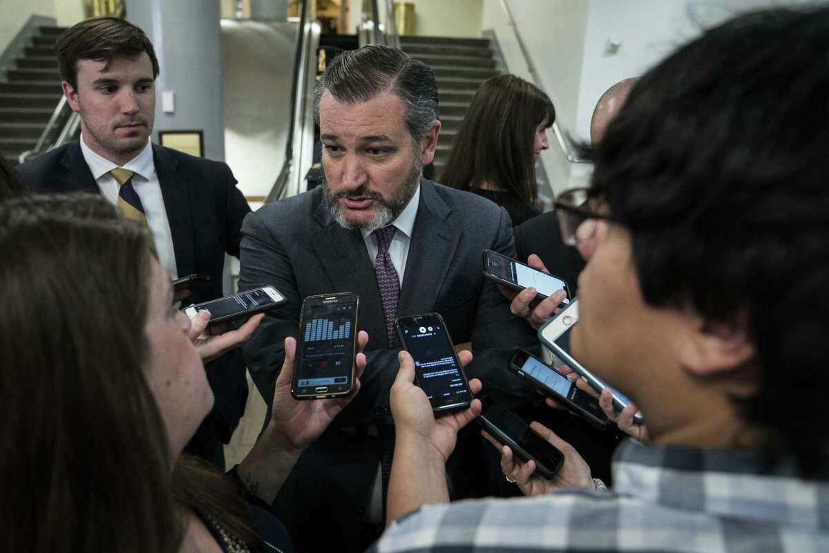 Senator Ted Cruz, a Republican from Texas, center, speaks with members of the media in the Senate Subway following a closed door briefing with members of the Senate at the U.S. Capitol in Washington, D.C., U.S., on Wednesday, Jan. 8, 2020. Lawmakers received a briefing from the Pentagon today on the killing of Iranian General Qassem Soleimani, less than 24 hours after Iran retaliated for the U.S. airstrike with rocket attacks in Iraq. Photographer: Sarah Silbiger/Bloomberg