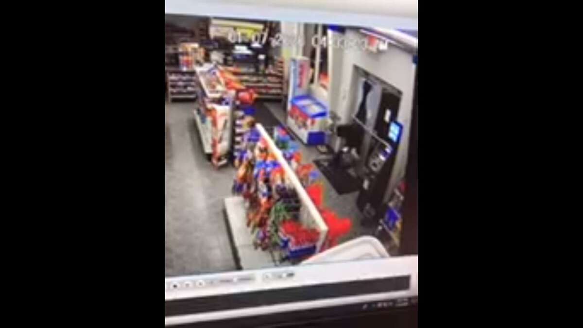 Still images from surveillance footage of a reported burglary at First Fuel in North Haven.
