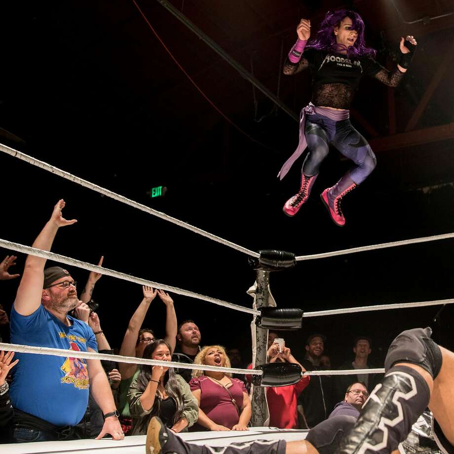Sam Khandaghabadi, known in the ring as Dark Sheik, bodyslams D-Rogue while facing off during a Hoodslam event at Oakland Metro Operahouse in Oakland, Calif. Friday, Dec. 6, 2019. Photo: Jessica Christian / The Chronicle 2019