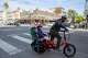 Ed Parillon rides a bike with his two-year-old son Simon Parillon (left) and four-year-old daughter Louise Parillon, Friday, Jan. 3, 2020, in San Francisco, Calif. Parillon runs errands and uses a bike instead of a car.