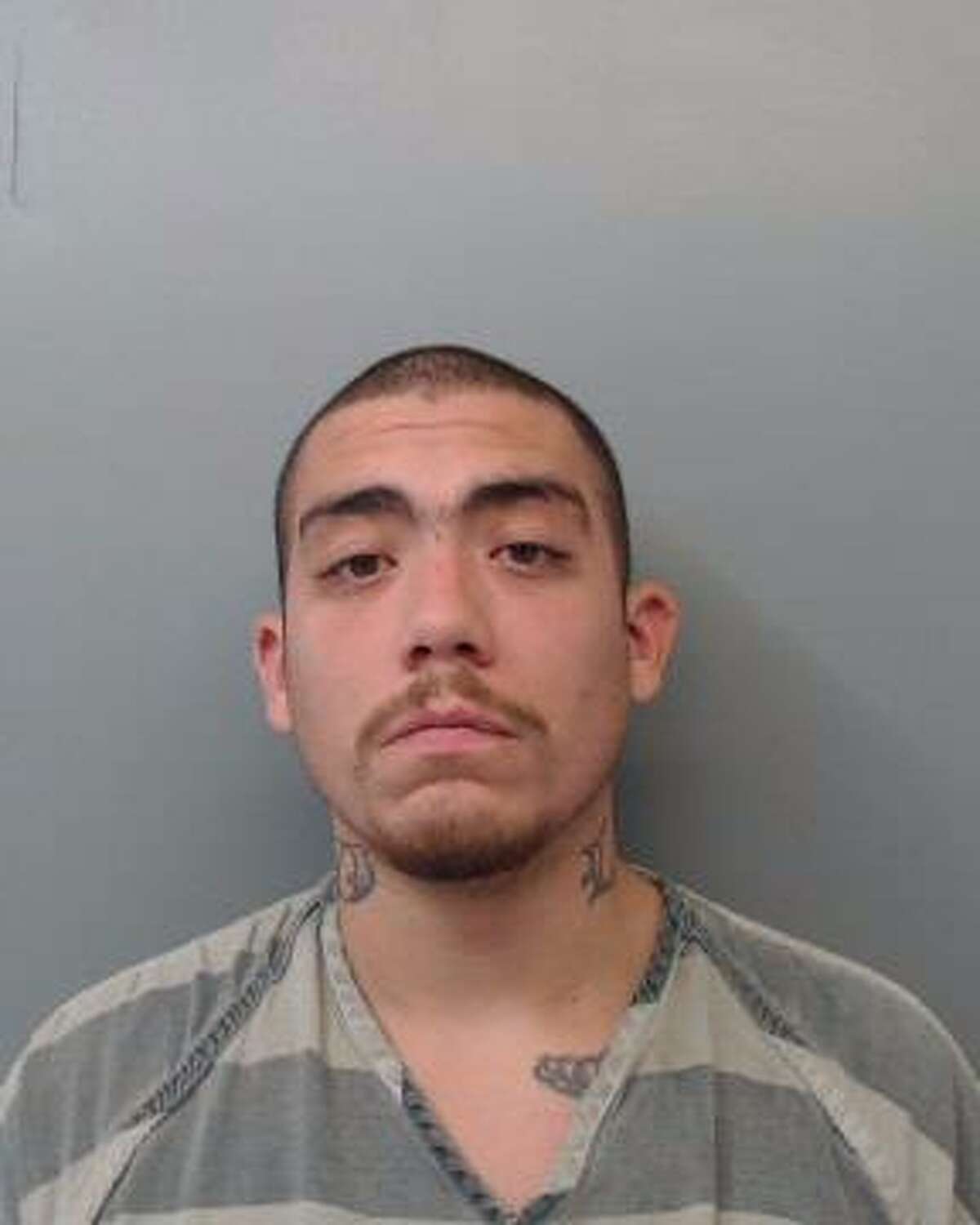 Justin Jay de Luna, 26, was charged with assault, family violence.