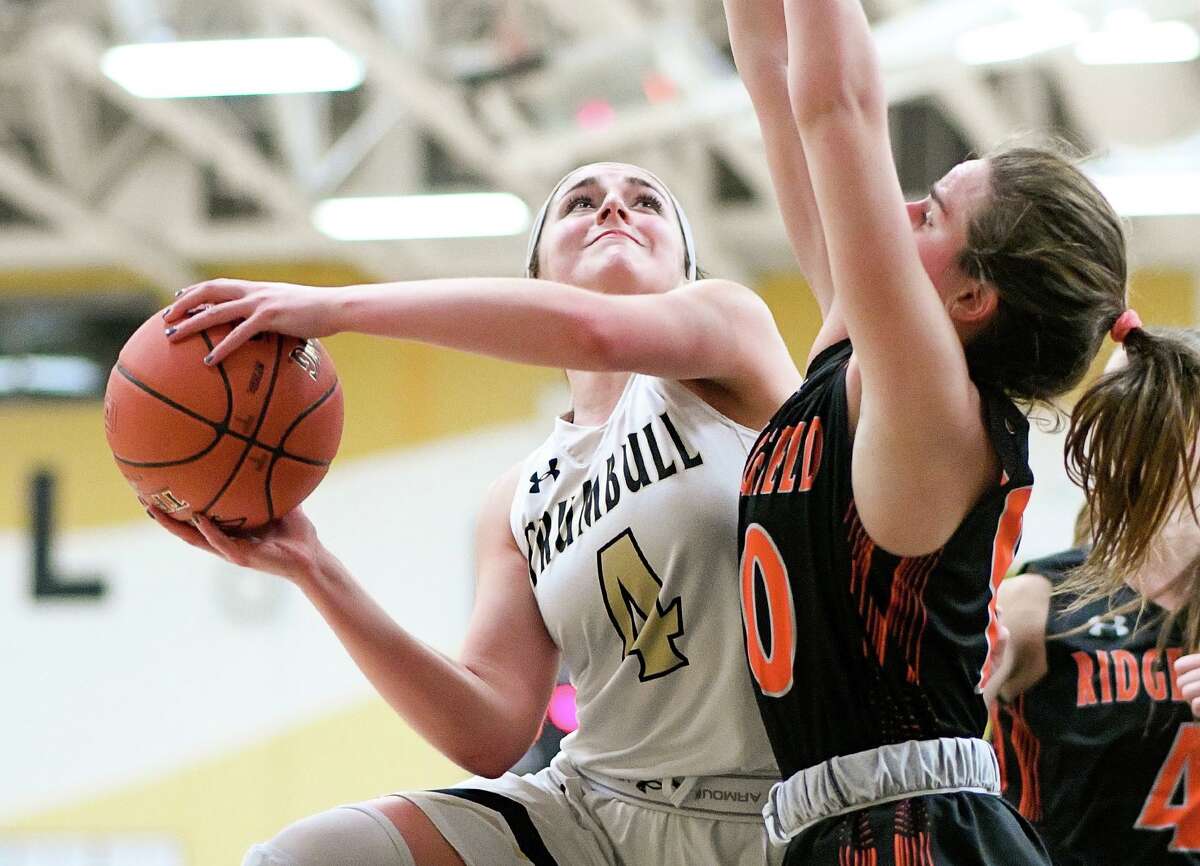 Sarah Stolze takes the ball inside during Trumbull's game with Ridgefield.