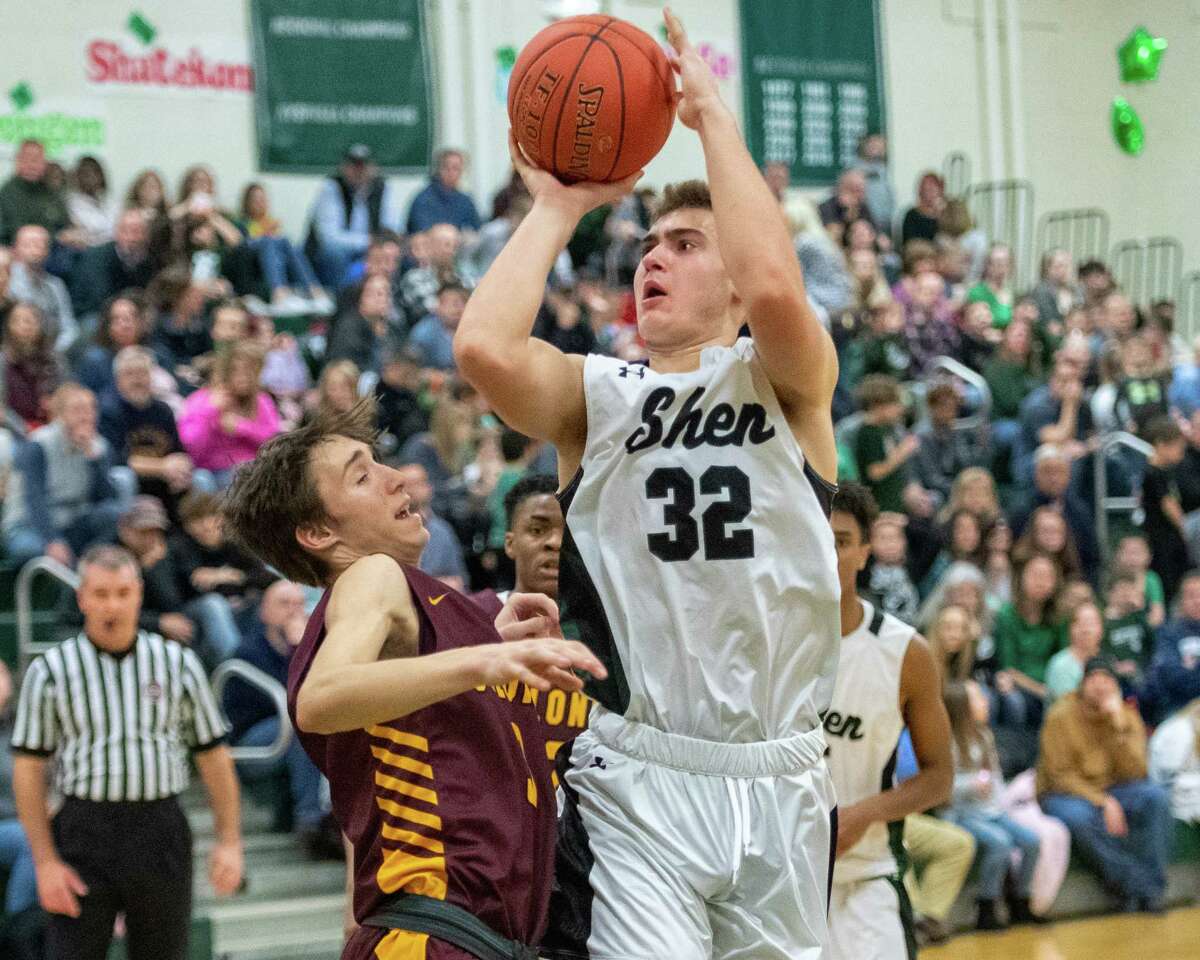 Shenendehowa senior Jake Reinisch takes a jumper over Colonie senior Dylan Antoniak during a Suburban Council game at Shenendehowa High School on Friday, Jan. 10, 2019 (Jim Franco/Special to the Times Union.)