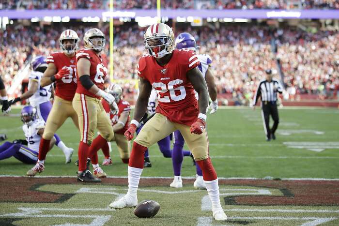 San Francisco 49ers cornerback Richard Sherman (25) breaks up a pass  intended for Minnesota Vikings wide receiver Adam Thielen (19) during an  NFL divisional playoff game, Saturday, Jan. 11, 2020, in Santa