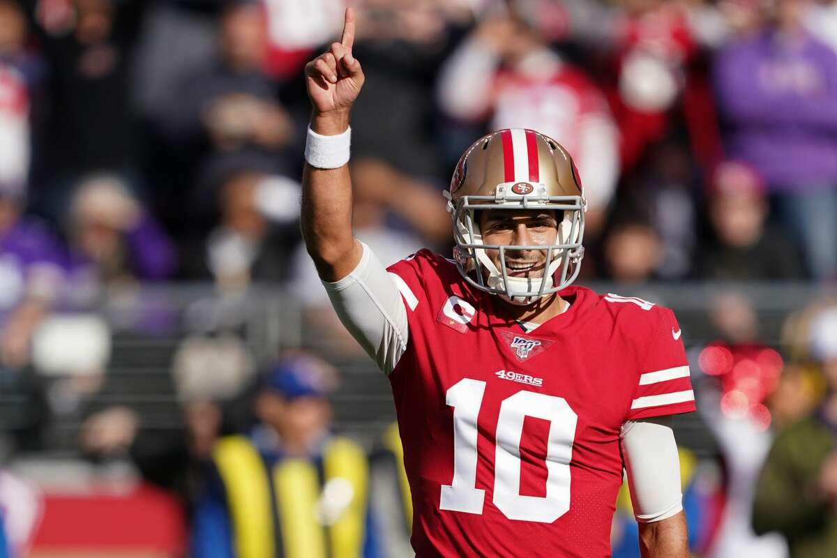 Jimmy Garoppolo #10 of the San Francisco 49ers reacts to throwing a touchdown pass in the first quarter during the NFC Divisional Round Playoff game against the Minnesota Vikings at Levi's Stadium on January 11, 2020 in Santa Clara, California. (Photo by Thearon W. Henderson/Getty Images)