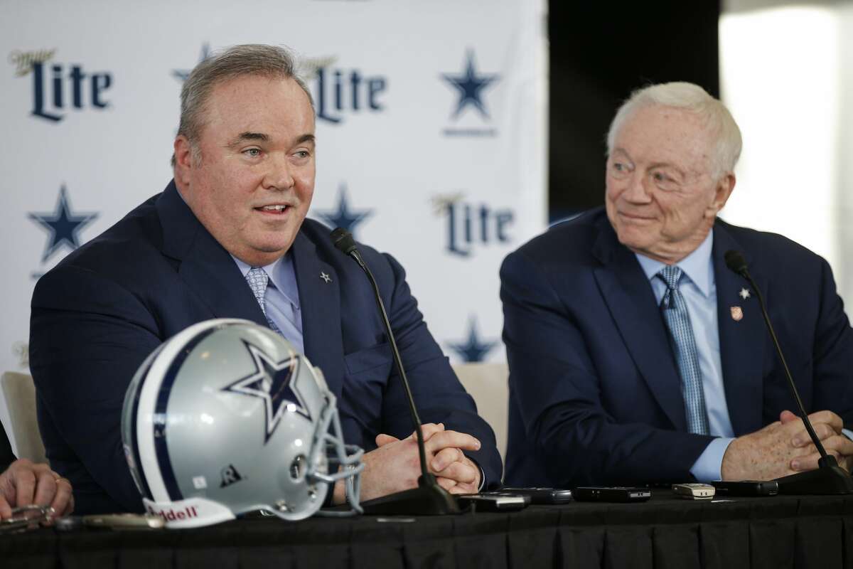 New Dallas Cowboys head coach Mike McCarthy, left, is introduced by team owner Jerry Jones, right, during a press conference at the Dallas Cowboys headquarters Wednesday, Jan. 8, 2020, in Frisco. (AP Photo/Brandon Wade)